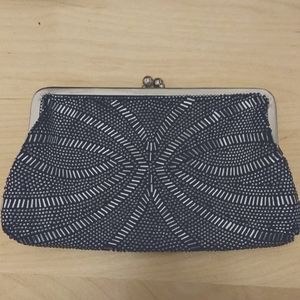 Black, metal-beaded clutch